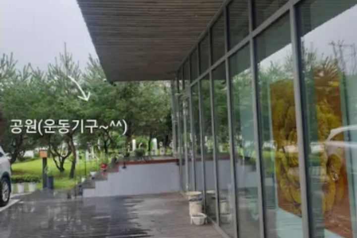 A glass-walled room with a terrace 15th image