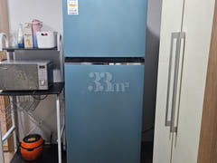 It is a studio apartment with a kitchen. 5th image