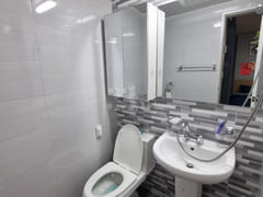 It is a neat, newly built room. 13th image
