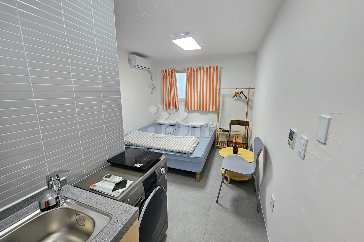 Bright and clean studio room for two 14th image