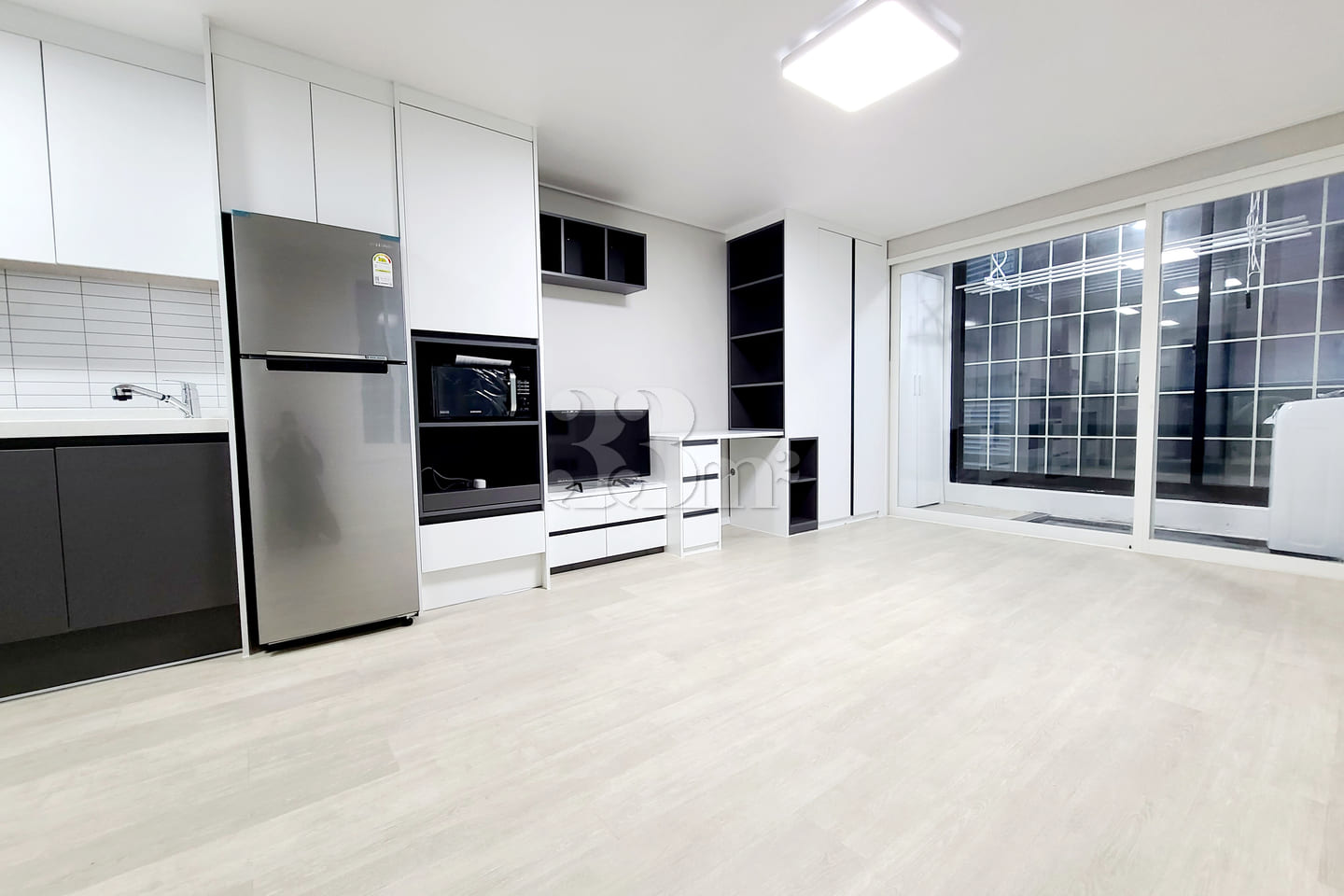 Clean, fully-furnished studio apartment 2th image
