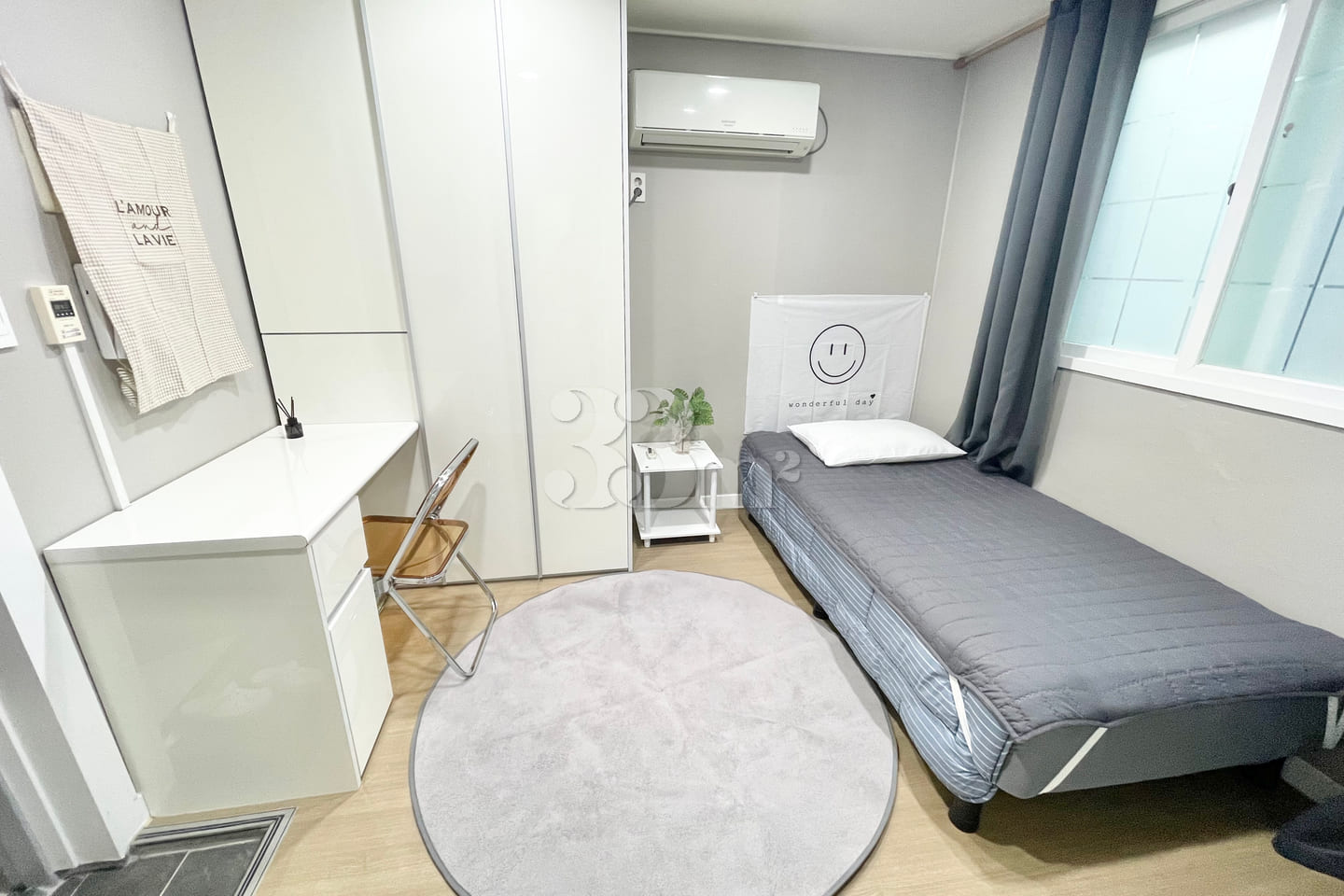 Newly remodeled white-toned room 6th image