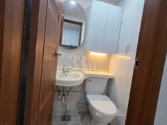 It is a neat studio apartment. 5th image
