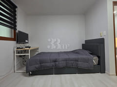It is a neat studio apartment. 2th image