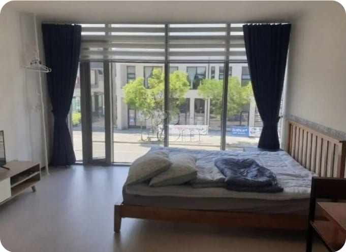 A room with a beautiful view and floor-to-cei 0th image