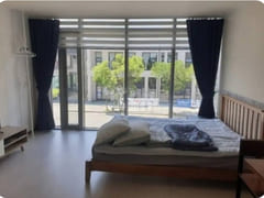 A room with a beautiful view and floor-to-cei 0th image