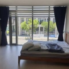 A room with a beautiful view and floor-to-cei Unit Image