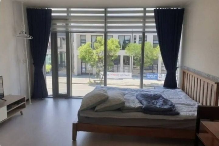 A room with a beautiful view and floor-to-cei 0th image