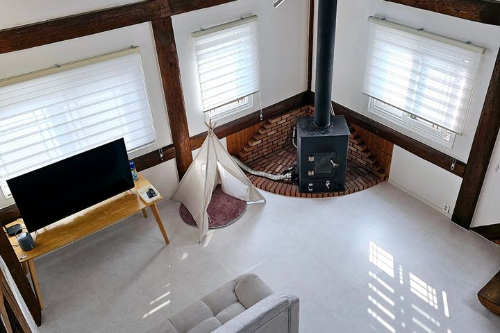Two-story log cabin 2th image
