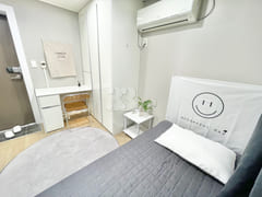 Newly remodeled white-toned room 4th image