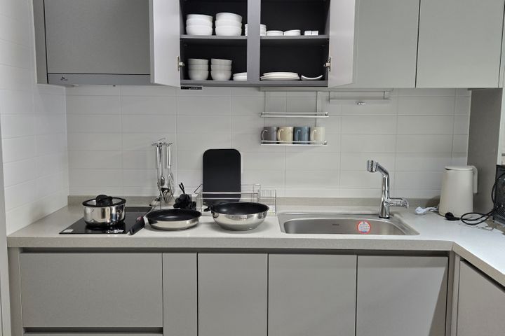Studio apartment with an ocean view living ro 4th image
