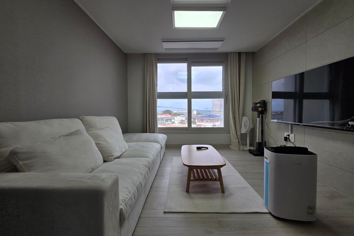 Studio apartment with an ocean view living ro 0th image