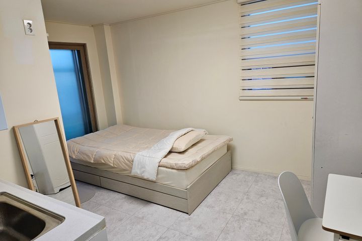 Room 407 in a studio apartment building in Hw 3th image