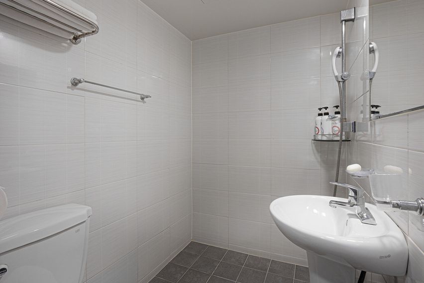 A cozy and tidy room. 4th image