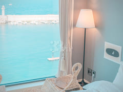 Jeju high-rise unit with full amenities and o 1th image