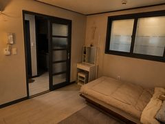Newly built, wood-toned interior near Seodaeg 5th image