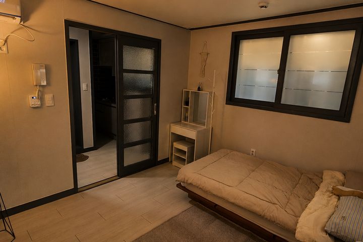 Newly built, wood-toned interior near Seodaeg 5th image