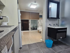 Fully furnished studio-style unit 5th image