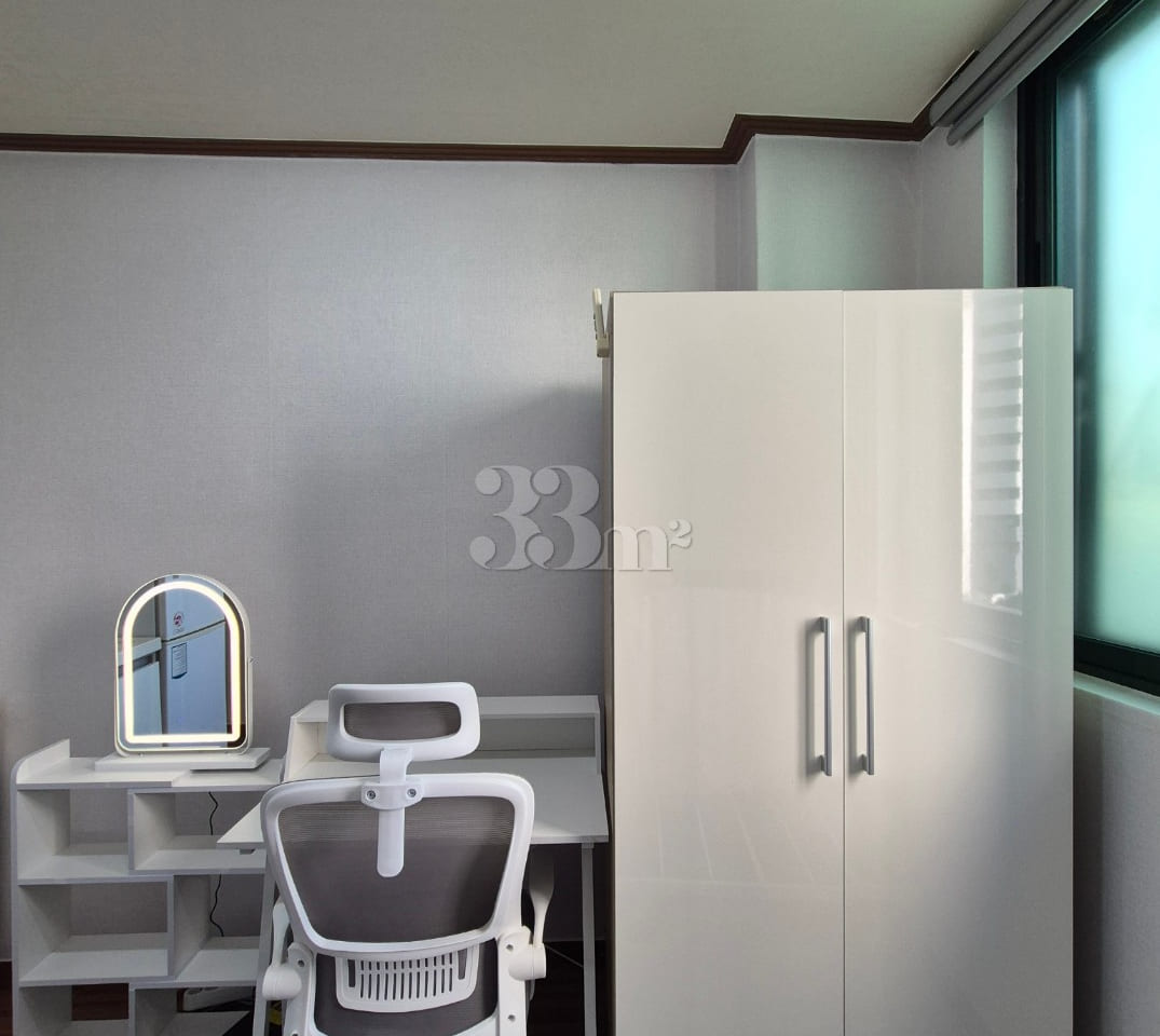 A studio apartment with a convenience store r 1th image