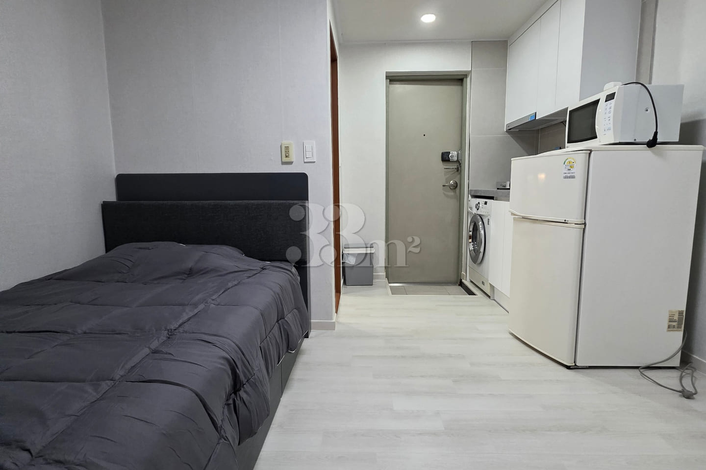 It is a neat studio apartment. 0th image