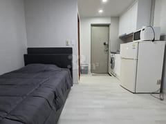 It is a neat studio apartment. 0th image