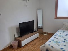 A quiet, comfortable, and spacious room 4th image