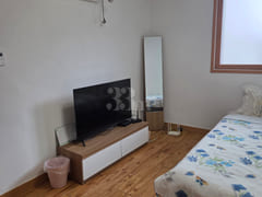 A quiet, comfortable, and spacious room 4th image