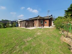Country house with a lawn 1th image