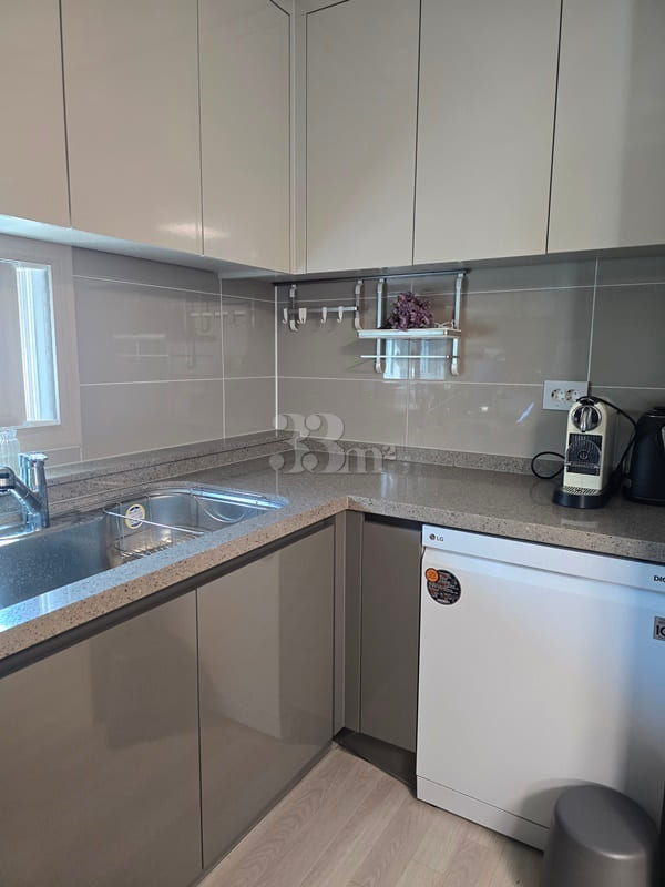 Songdo high-rise unit with 3 bedrooms and a s 4th image