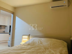 65-inch TV with separate bedroom and living r 14th image