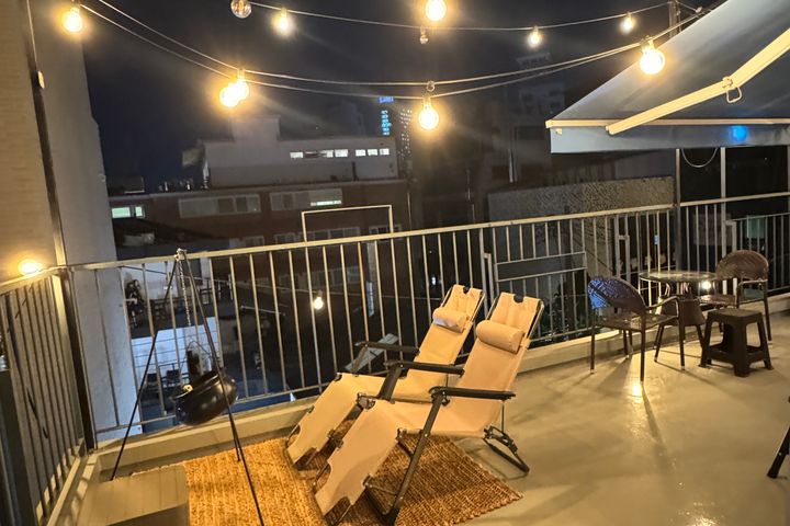 Rooftop on Hongdae's main street 🏕️ 13th image