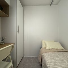 Mini-room with an interior-facing window and  Unit Image