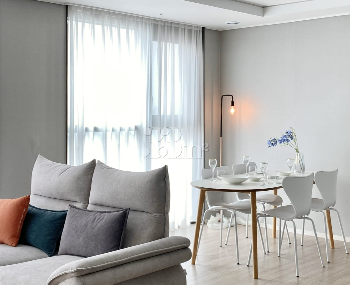 Living room and bedroom with lake view, separ 1th image
