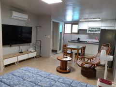 It's a clean two-story studio apartment. 0th image