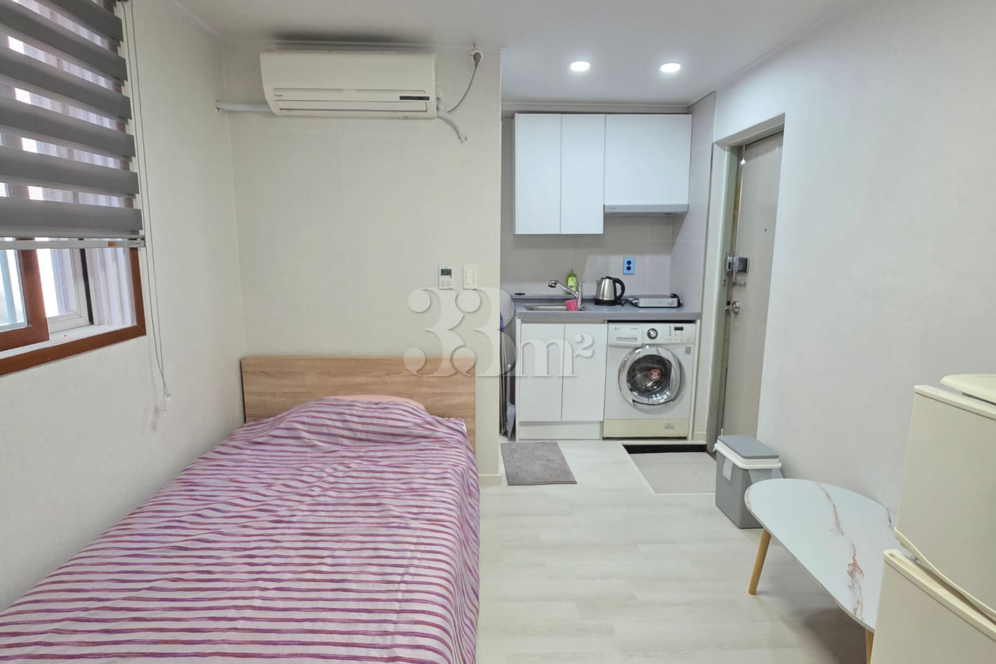 It is a neat studio apartment. 13th image