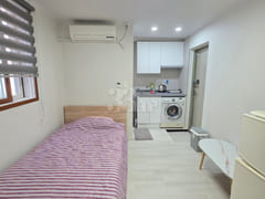 It is a neat studio apartment. 13th image