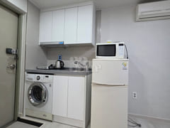It is a neat studio apartment. 3th image