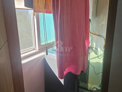 It is a studio apartment with a kitchen. 8th image