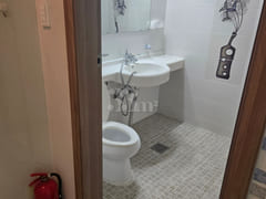 Neat room right next to the station 7th image