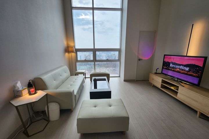 Right by the subway station. Spacious duplex 0th image