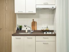 Fully furnished studio with a separate living 12th image