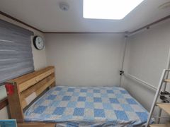 A sun-drenched room. 2th image