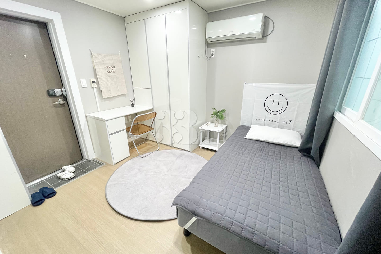 Newly remodeled white-toned room 5th image