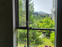 A room with a beautiful view and floor-to-cei 11th image