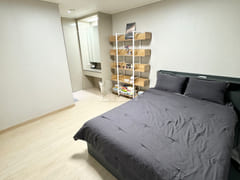 Fully-furnished apartment with great natural 9th image