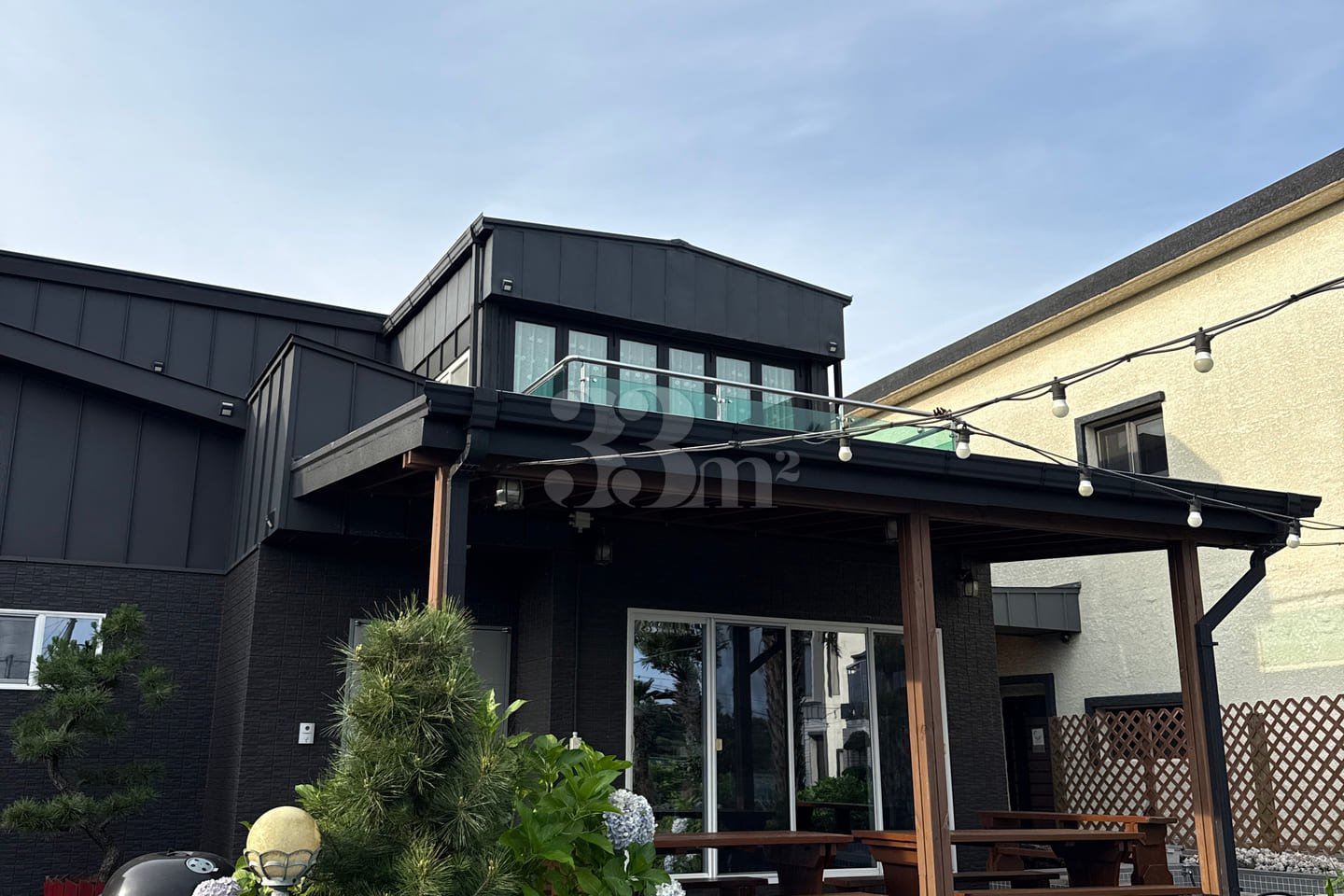 A house with a swimming pool and a yard 0th image
