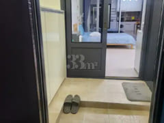 A room with a beautiful view and floor-to-cei 14th image