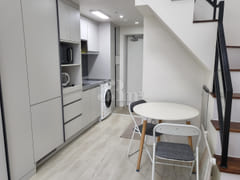 Duplex-style room with a terrace 4th image