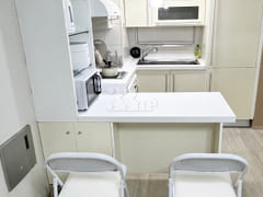 Two-bedroom duplex with a connecting path to 5th image