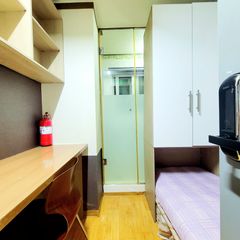 Unit 310: Studio-style room with an exterior  Unit Image